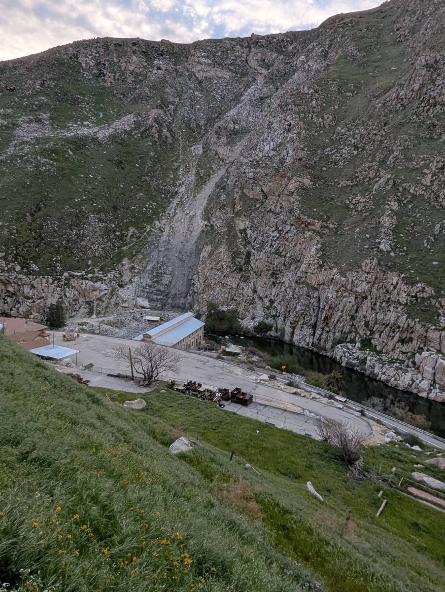 The KR1 Power Station viewed from the proposed trail above — the powerhouse trail runs along this hillside